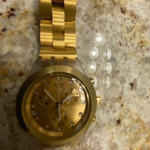 Swatch watch gold color